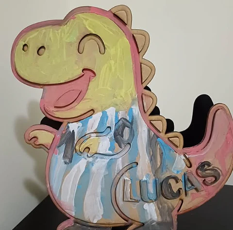 Dino porta lápices