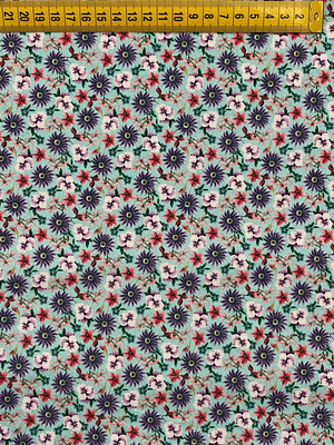 Tecido Com Fundo Azul Com Flores Roxas 