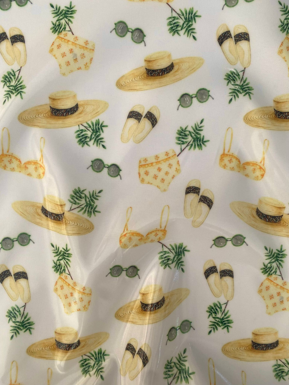 Tecido plastificado com motivos de praia  1