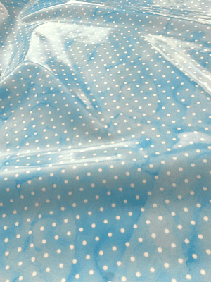 Tecido plastificado azul com bolinhas brancas