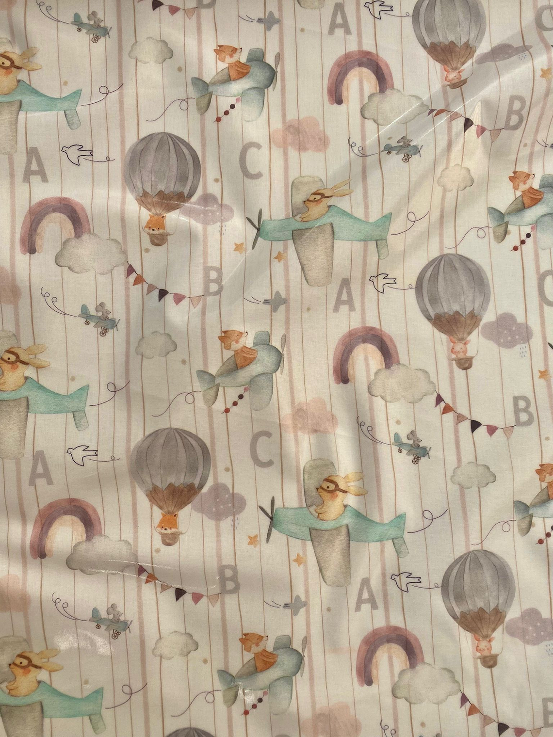 Tecido plastificado com animais em aviõezinhos  1