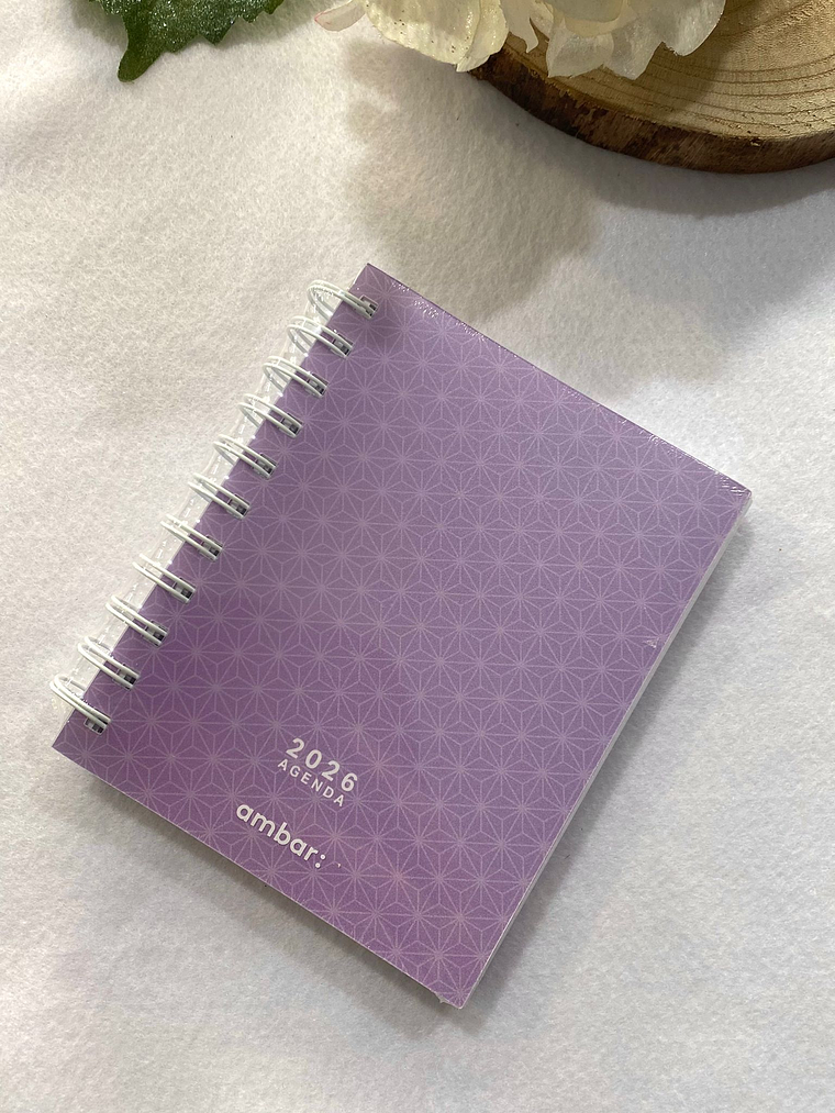 Agenda roxa com figura geométrica 2026 1