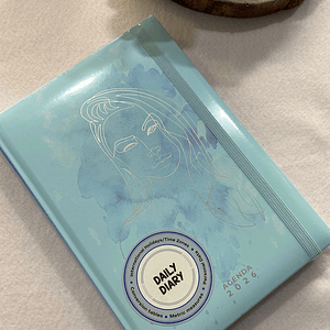 Agenda azul com rosto dourado 2026