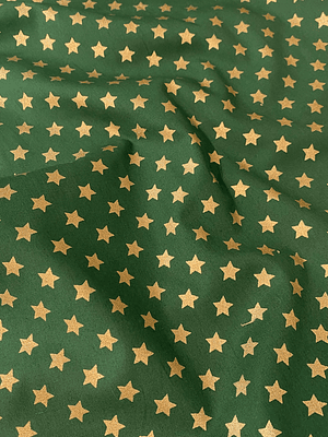 Tecido verde com estrelinhas douradas 