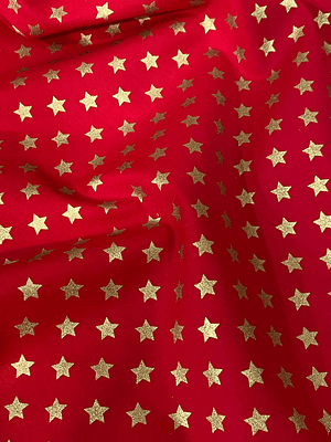 Tecido vermelho com estrelinhas douradas 