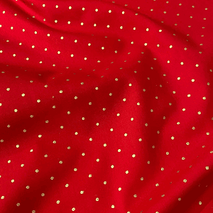 Tecido vermelho com bolinhas douradas