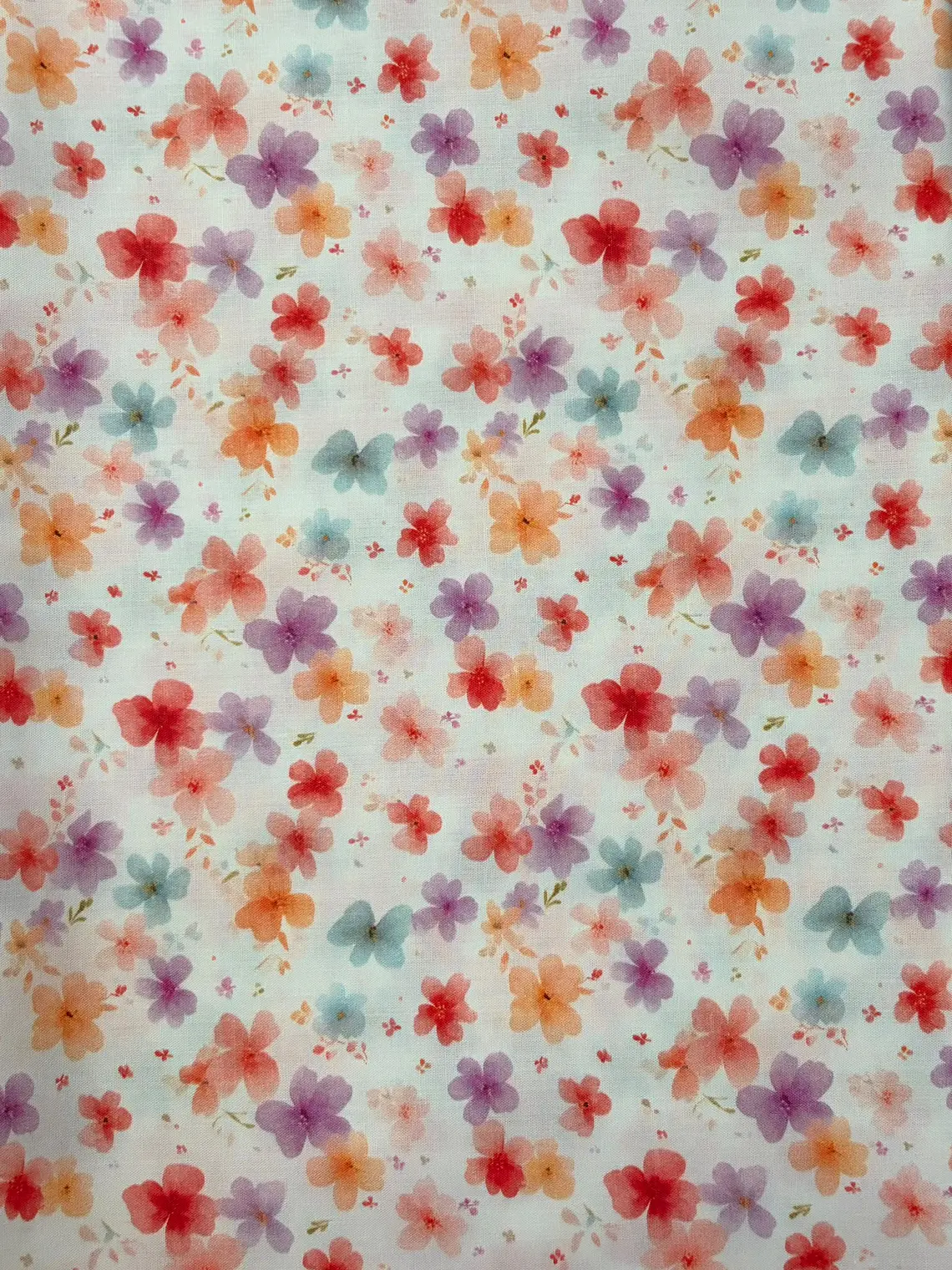 Tecidos com flores coloridas 1