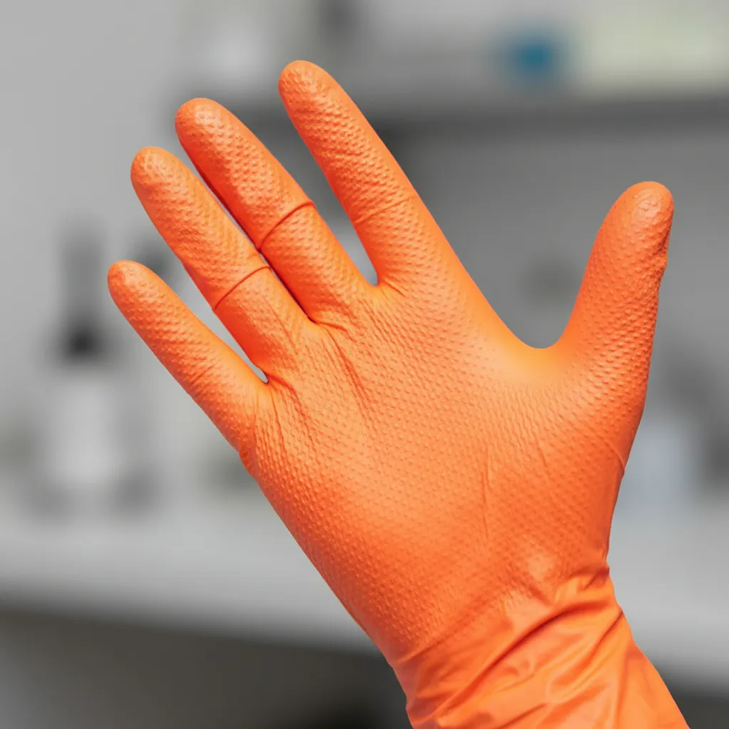 Guante de Nitrilo Naranja Texturizado 8g (50 unidades) 4