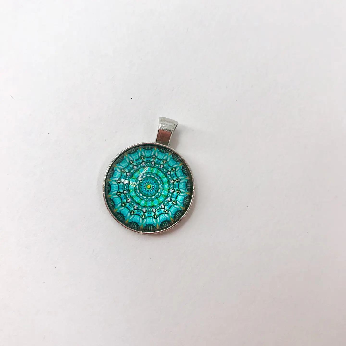 MANDALA EN ZAMAK TM2CM 9
