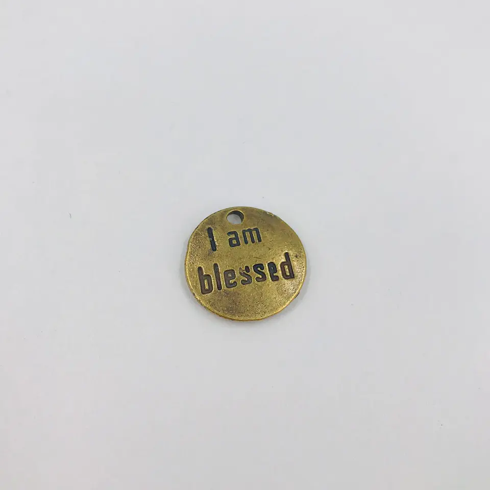 DIJE MONEDA CÍRCULO CON FRASE EN ZAMAK  3