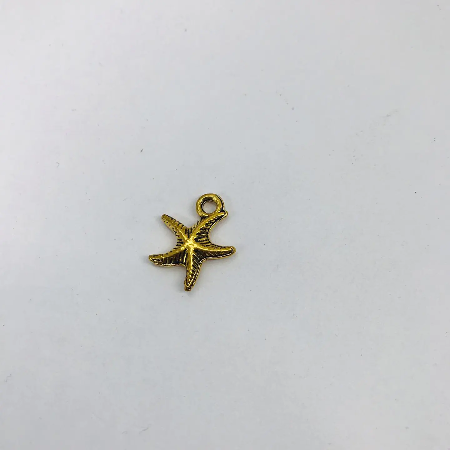 DIJE ESTRELLA DE MAR PEQUEÑA CRU391-2 1