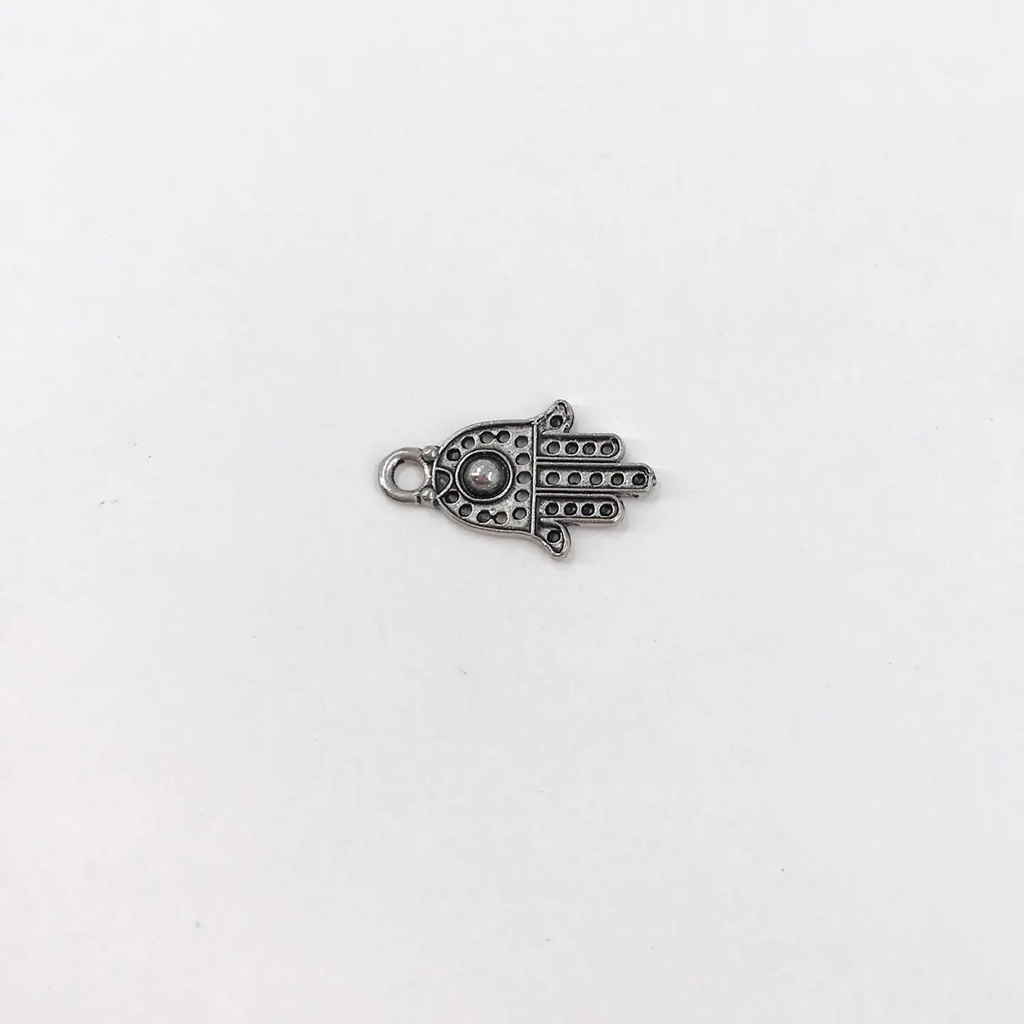 DIJE ✦ MANO HAMSA EN ZAMAK  1