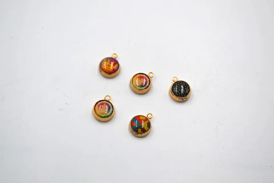 CÍRCULO CON MOTIVOS EN RESINA T077 1