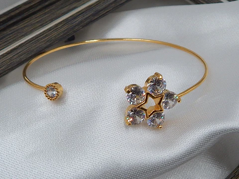 PULSERA FLOR ESTRELLA BAÑO DE ORO 