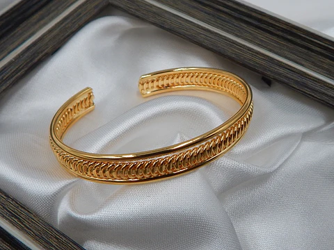 BRAZALETE TRENZADO BAÑO DE ORO 