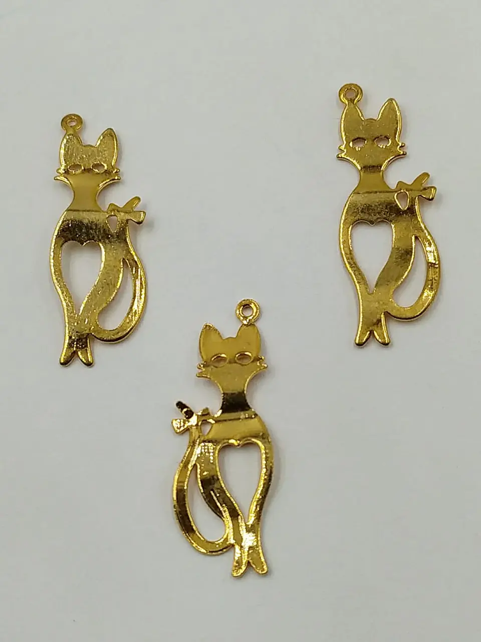 GATO BAÑO DE ORO T066                                   1