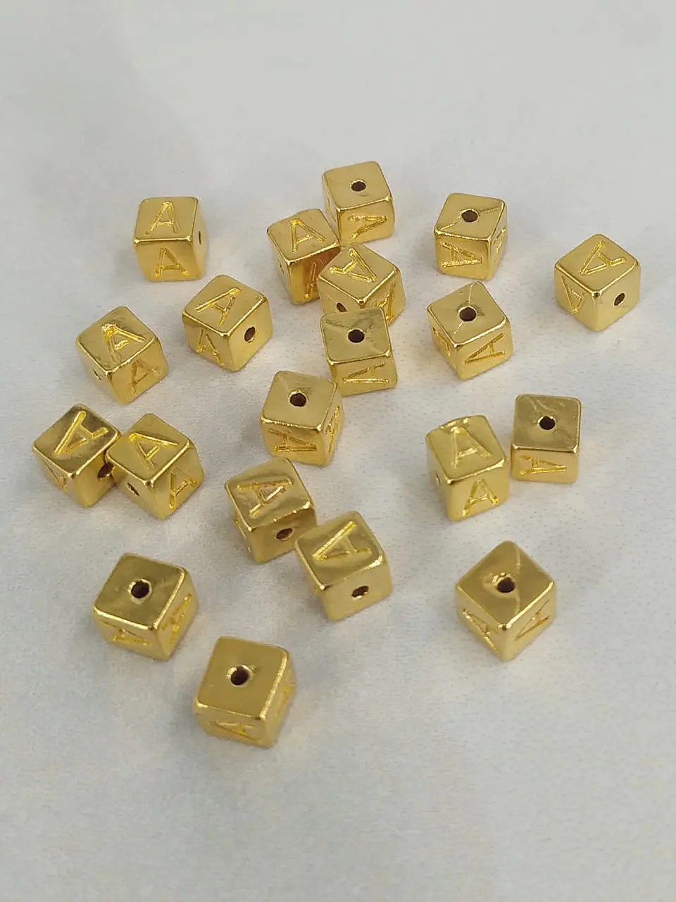 CUBO LETRAS 6MM ZAMAK B763                       1
