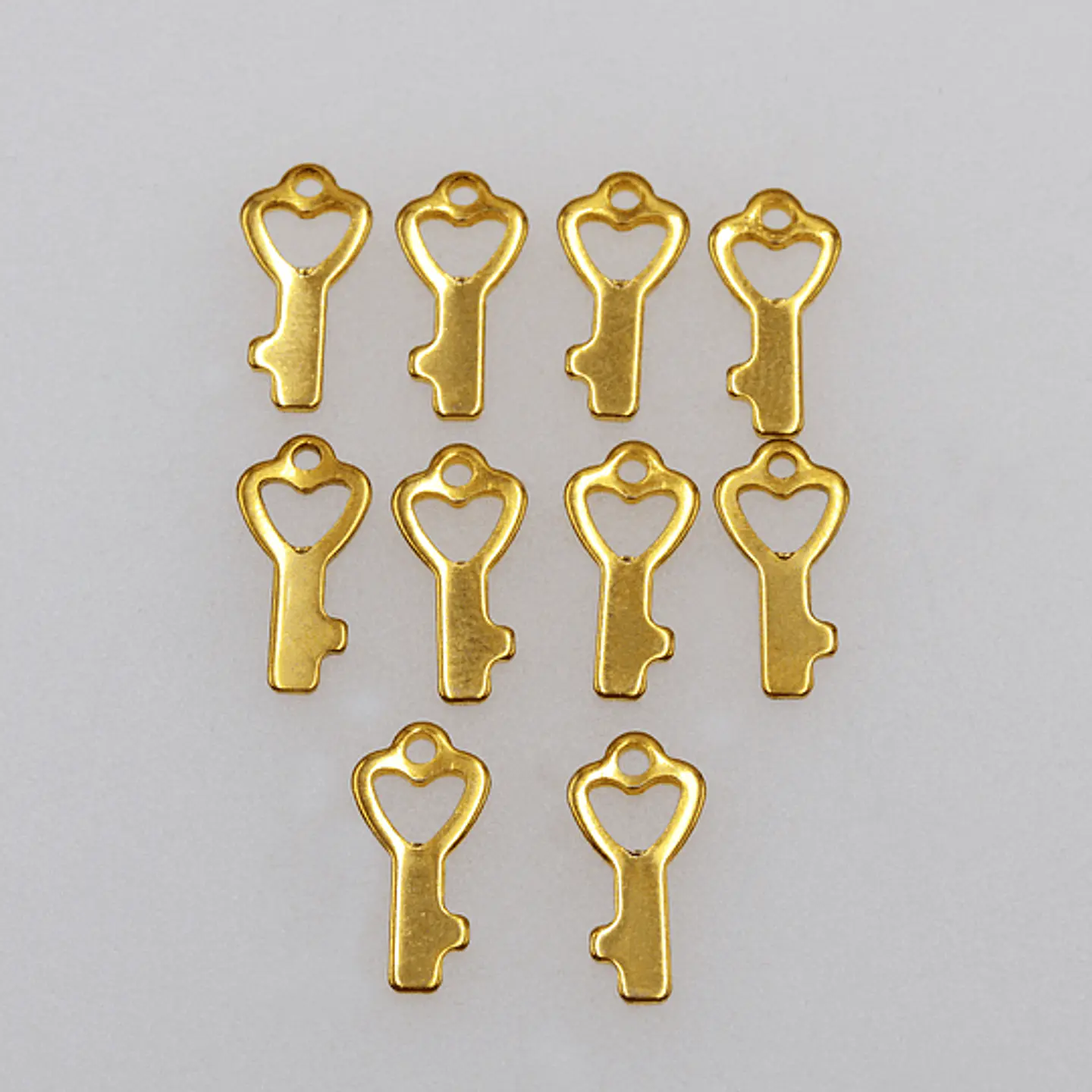 FIGURAS ACERO DORADO EG-025# 9