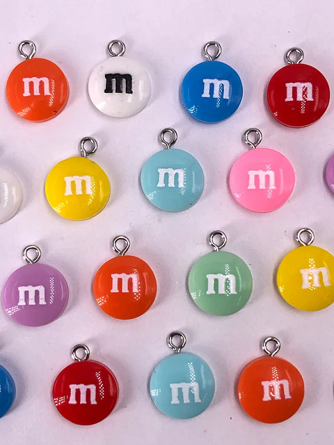 DIJE M&M COLORES PLÁSTICO MYMC/PLA1