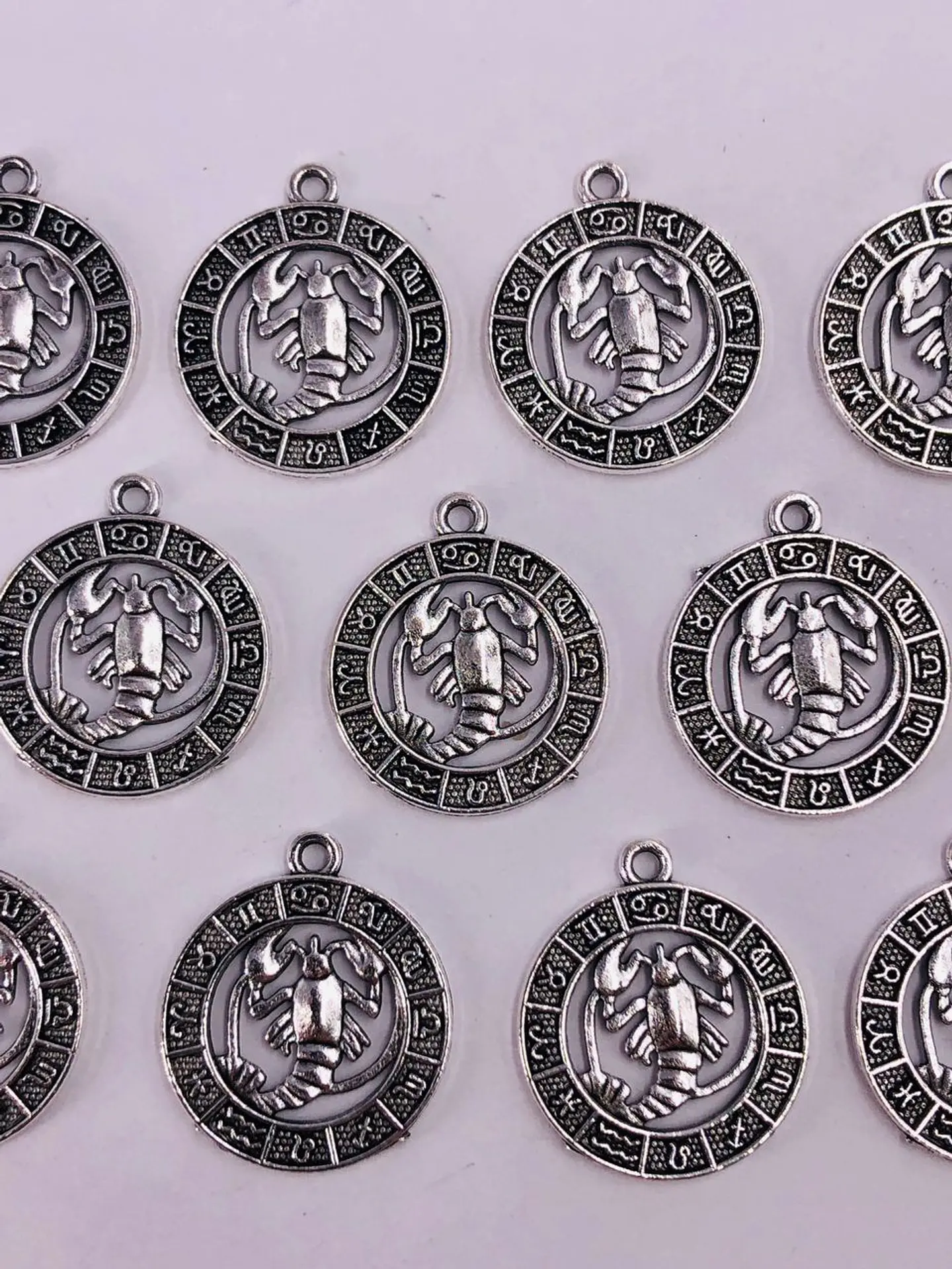 SIGNOS ZODIACALES ZAMAK NIQUEL W-8763 4