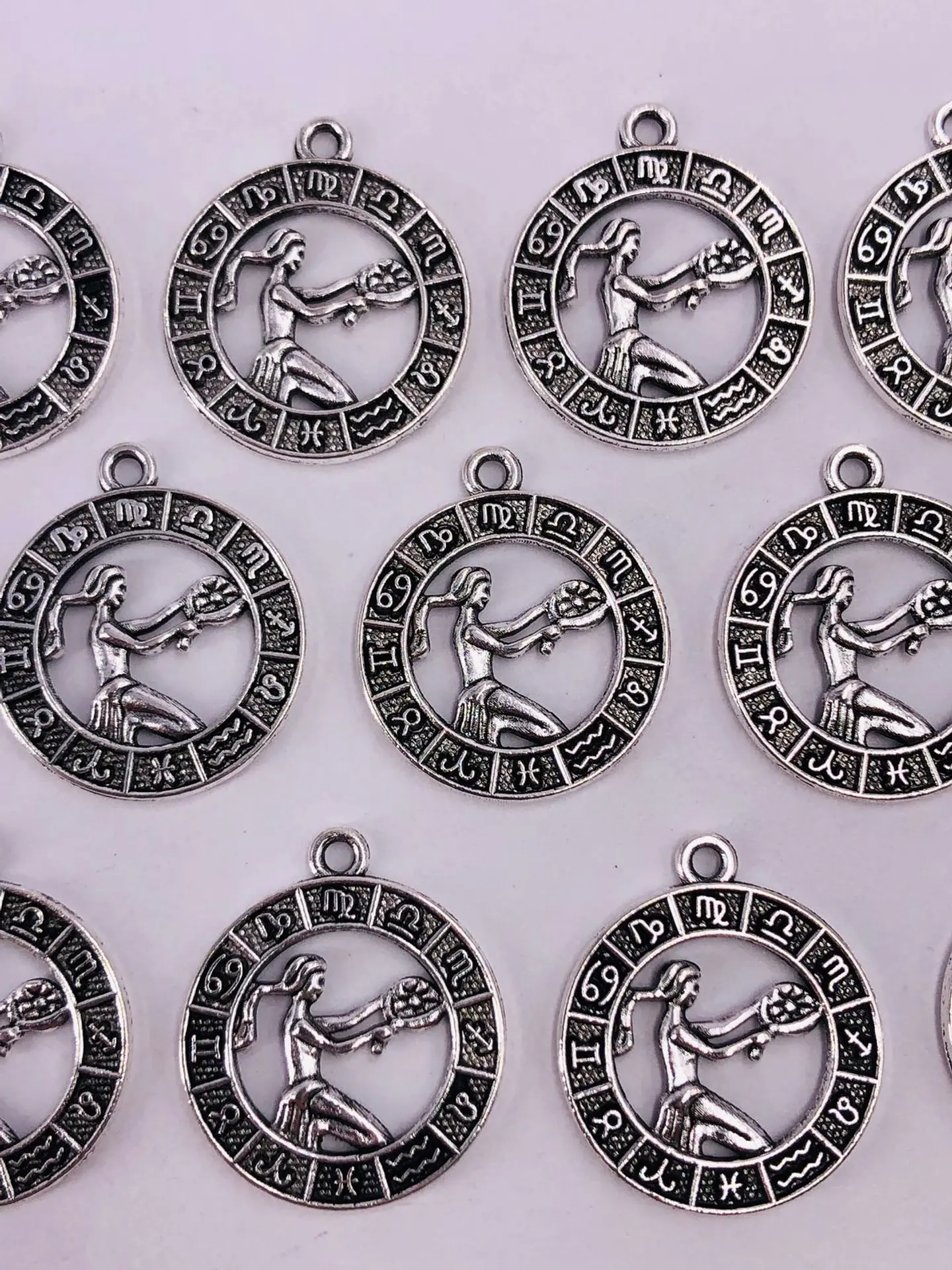 SIGNOS ZODIACALES ZAMAK NIQUEL W-8763 6