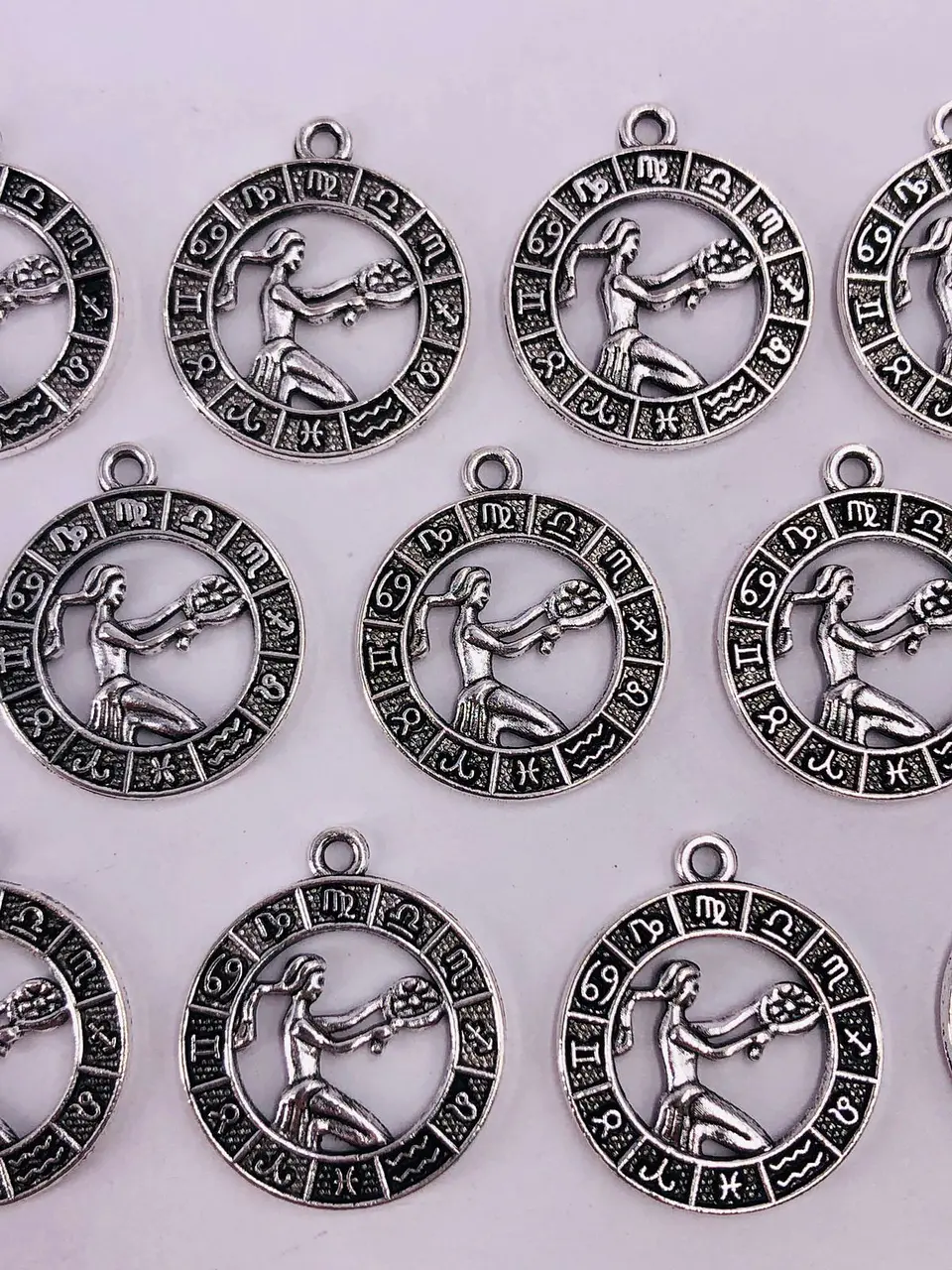 SIGNOS ZODIACALES ZAMAK NIQUEL W-8763 6