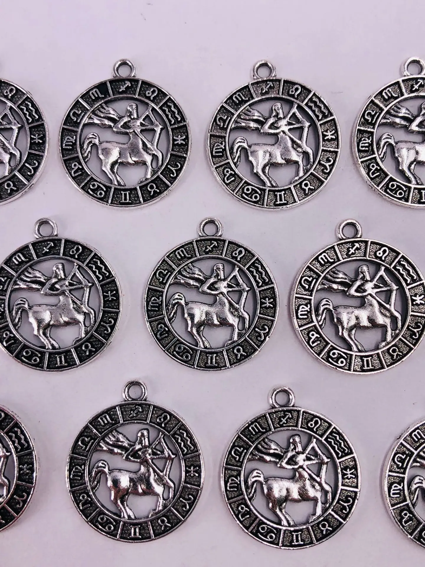 SIGNOS ZODIACALES ZAMAK NIQUEL W-8763 8