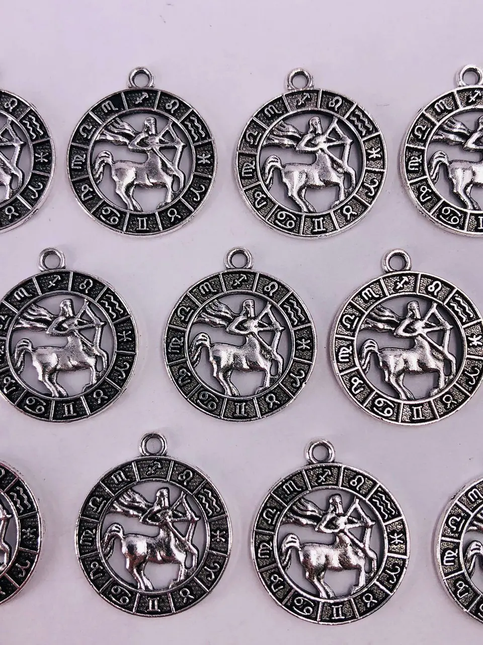 SIGNOS ZODIACALES ZAMAK NIQUEL W-8763 8