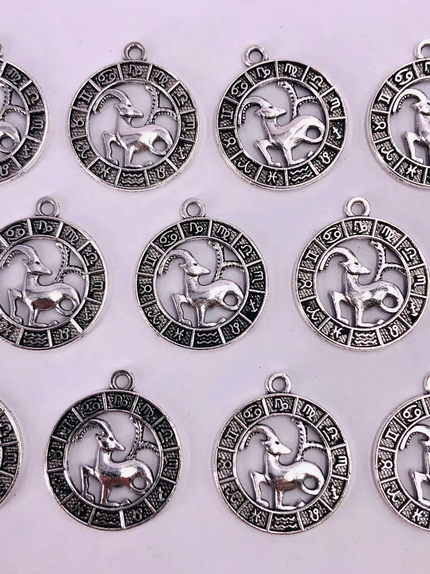 SIGNOS ZODIACALES ZAMAK NIQUEL W-8763 11