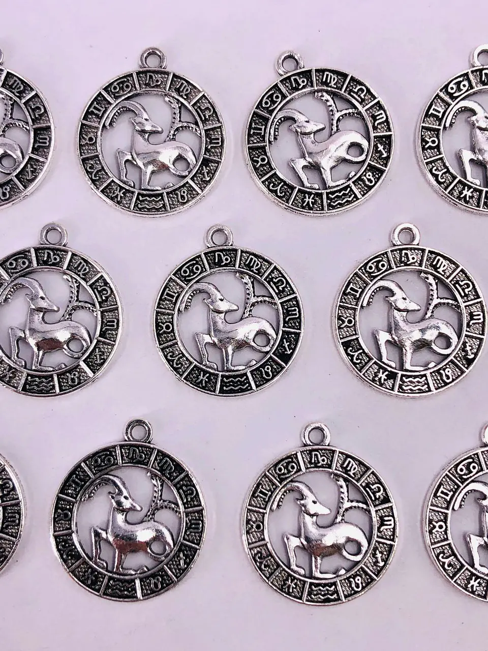 SIGNOS ZODIACALES ZAMAK NIQUEL W-8763 11