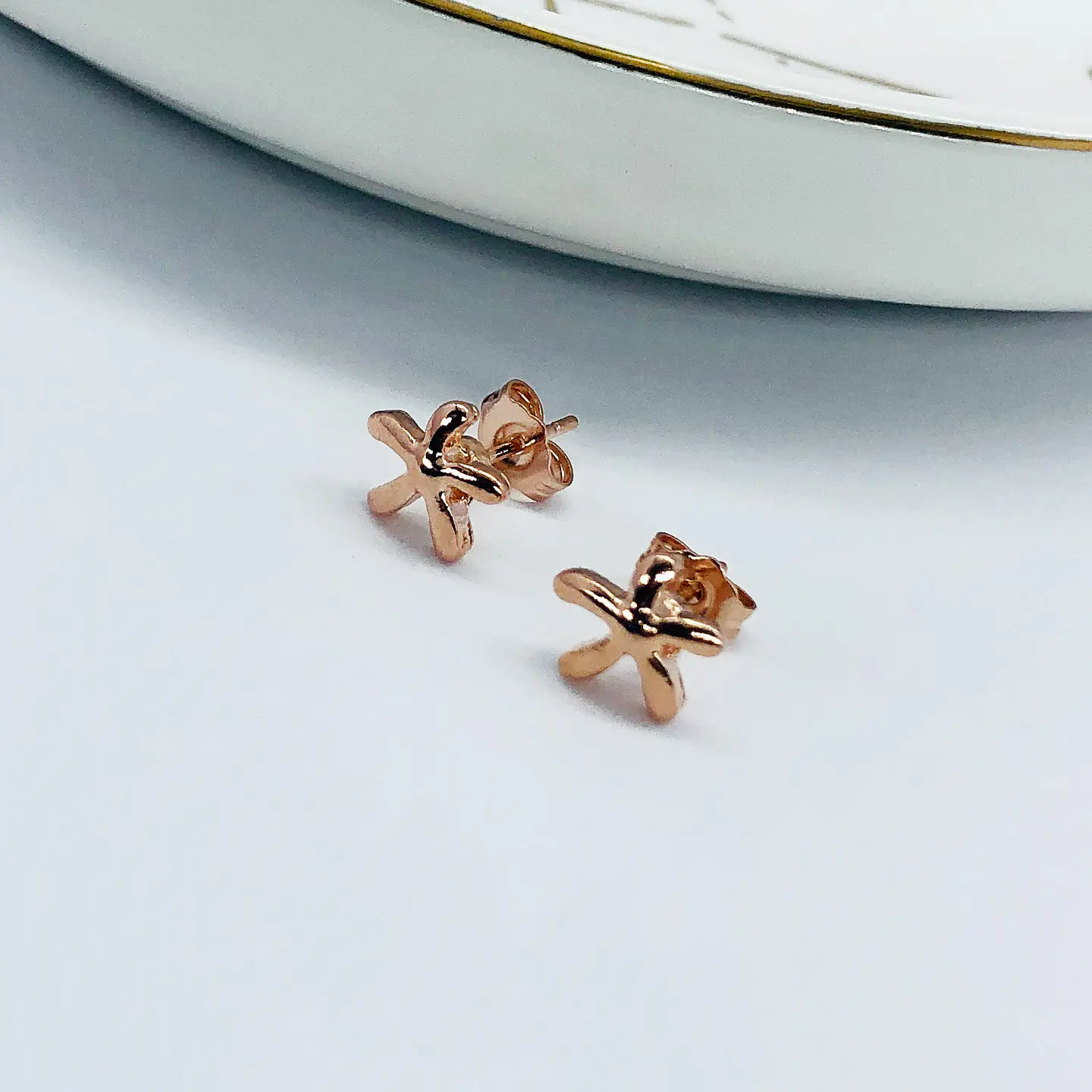 TOPO ✦ ESTRELLA DE MAR LISA BAÑO DE ORO ROSA 1