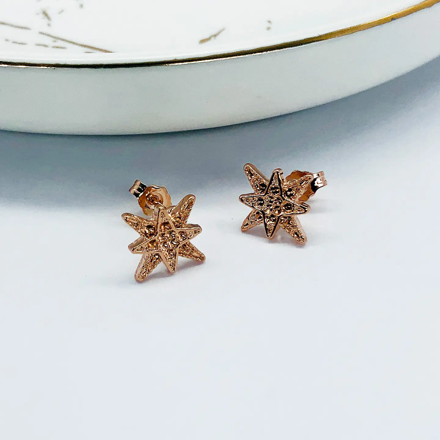 TOPO ✦ ESTRELLA PUNTAS BAÑO DE ORO ROSA 1