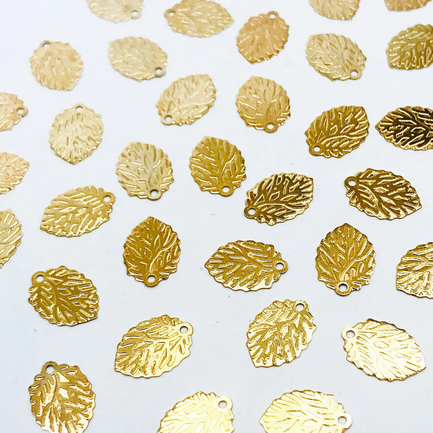 HOJA MINI DIJE BAÑO DE ORO CI55                               1