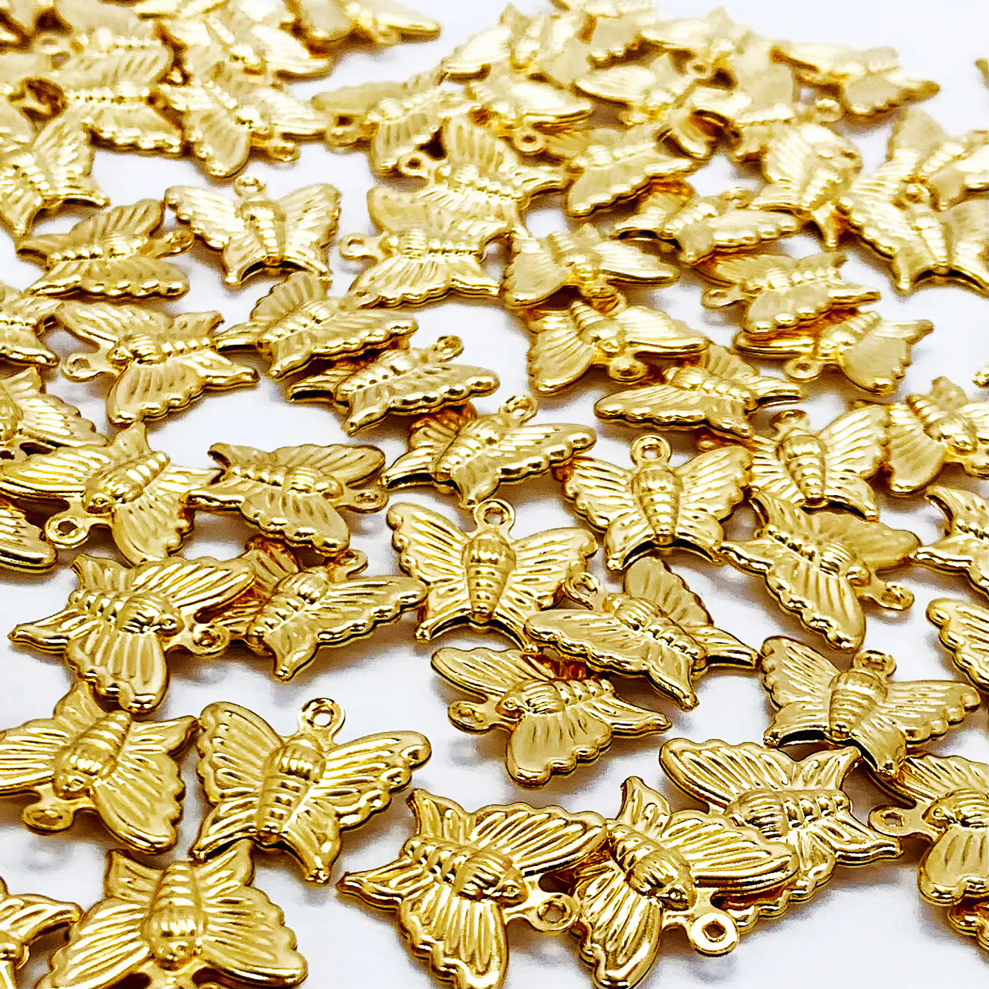 DIJE MARIPOSA BAÑO DE ORO XH00517 1