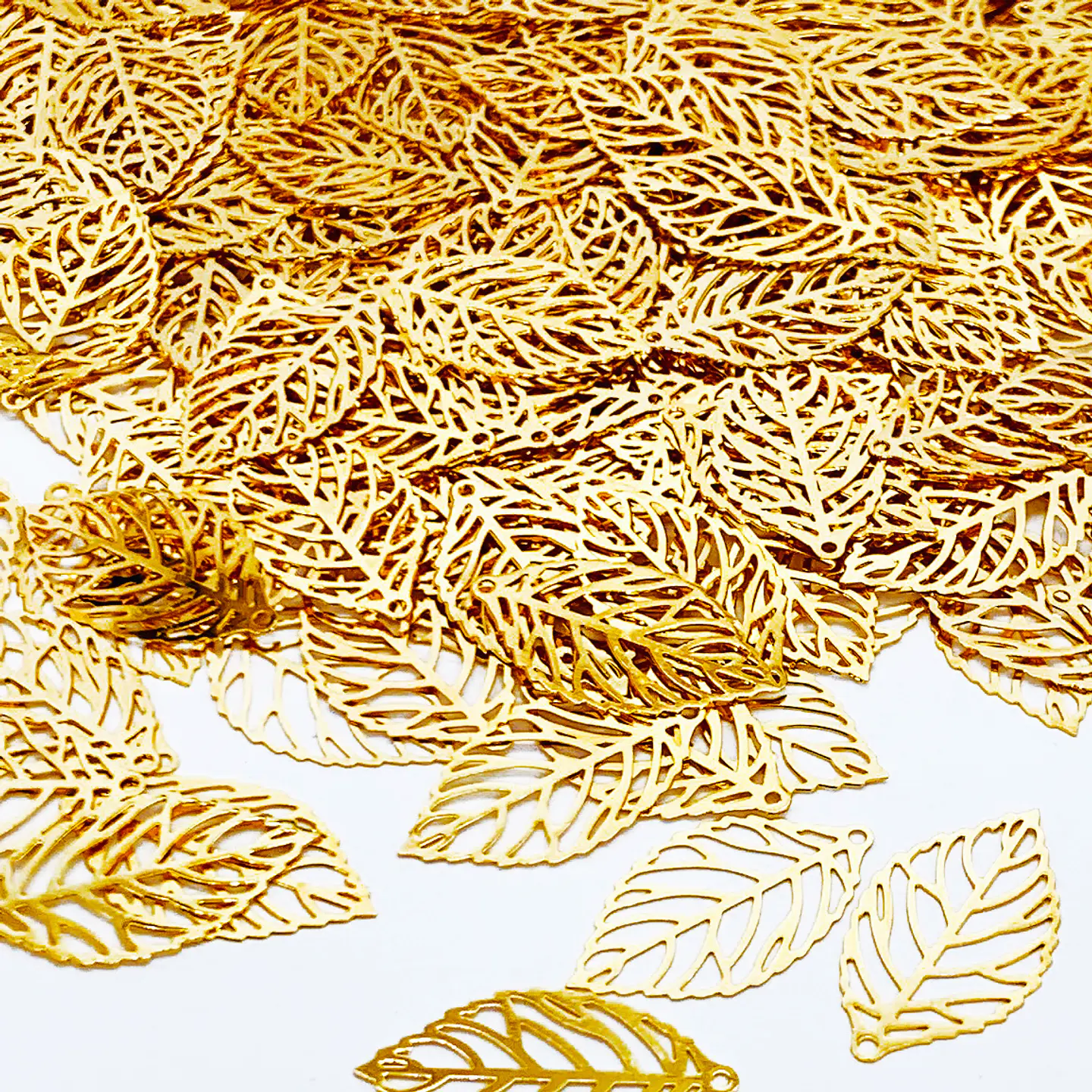 HOJA MINI DIJE BAÑO DE ORO T5263                             1