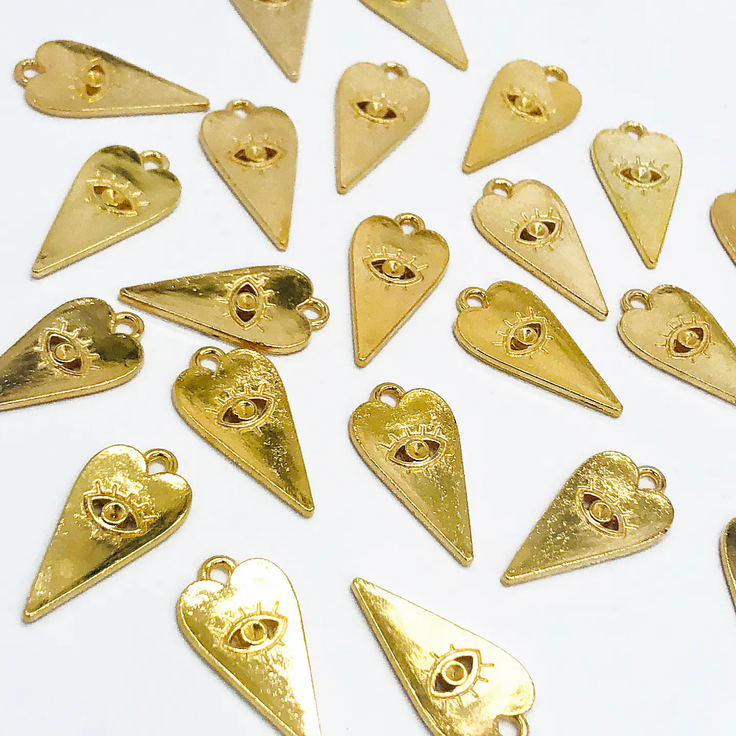 CORAZÓN OJO TURCO BAÑO DE ORO T7029 1