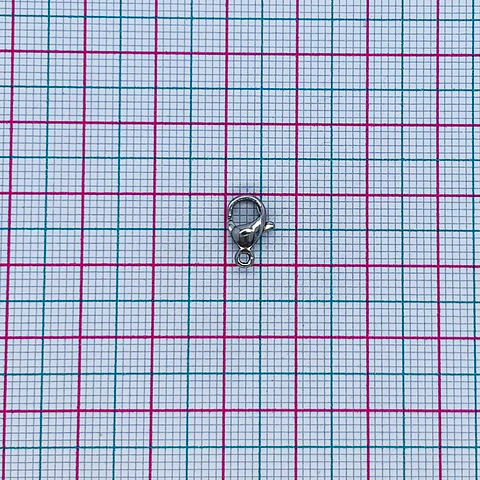 BROCHE ✦ PICO DE LORO ACERO
