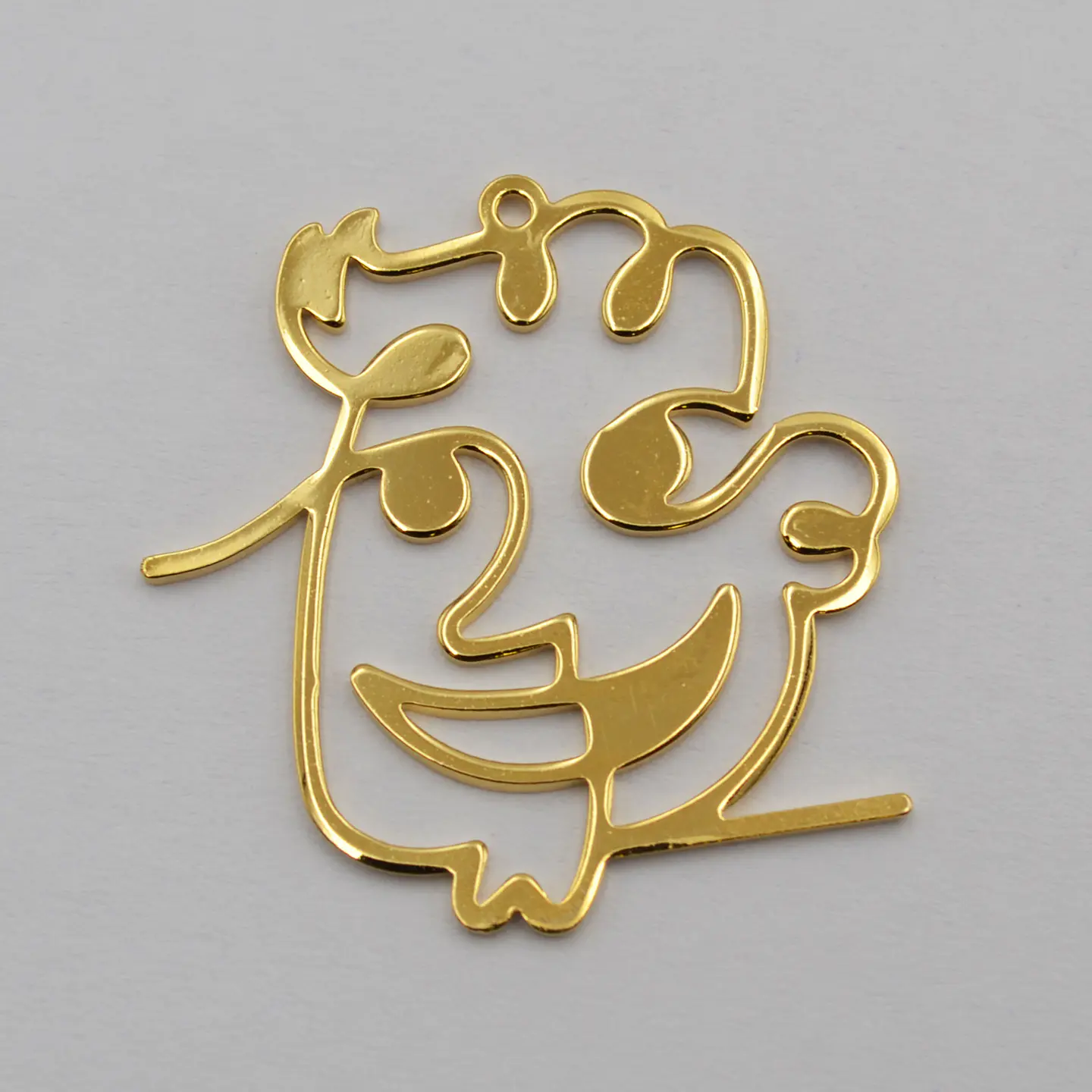 ROSTRO SILUETA BAÑO DE ORO TB7077  1