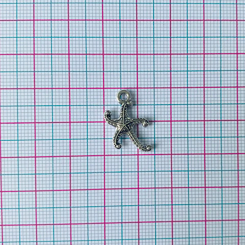 DIJE ✦ ESTRELLA DE MAR ZAMAK