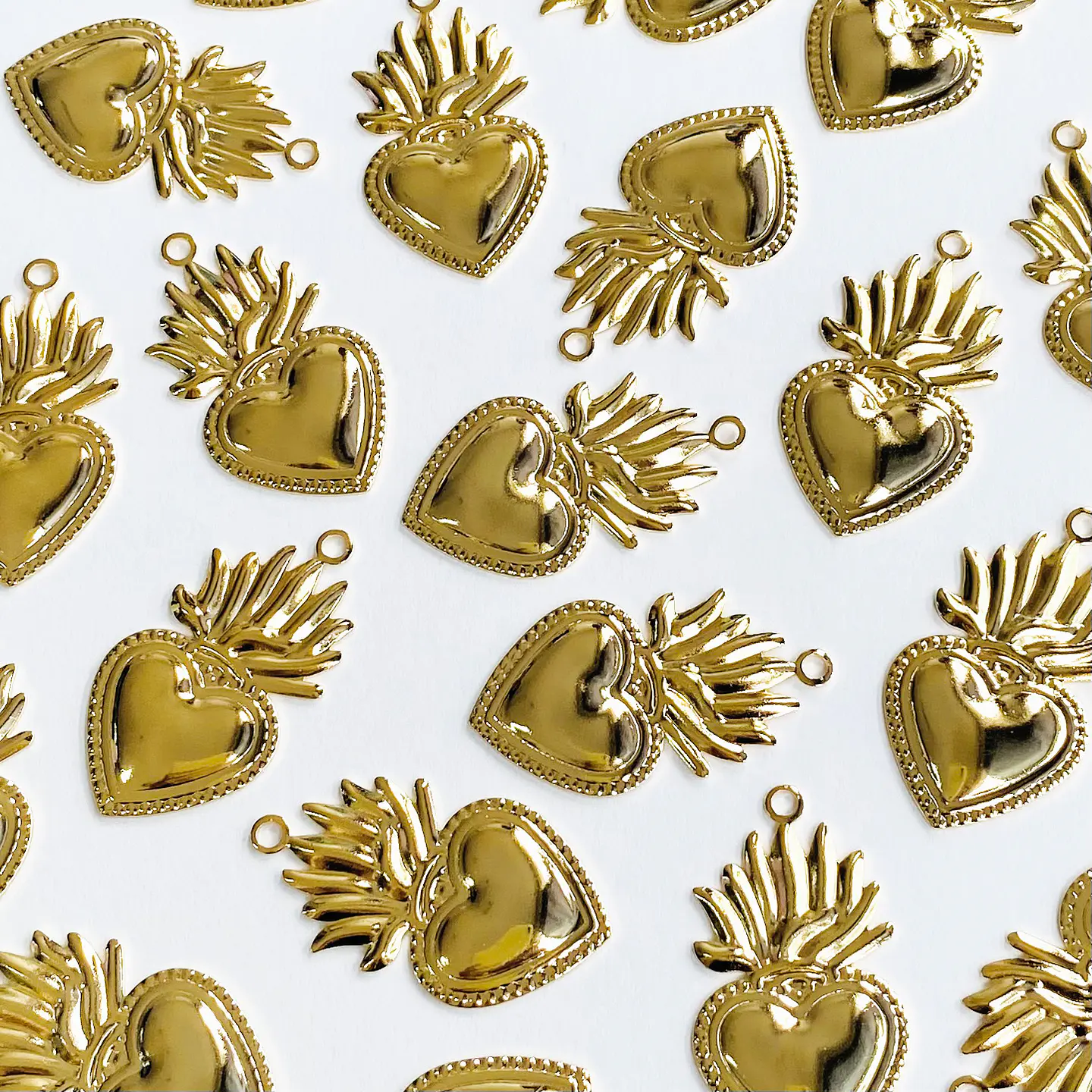 DIJE CORAZÓN NEOLÍTICO BAÑO DE ORO CG03530-G 1