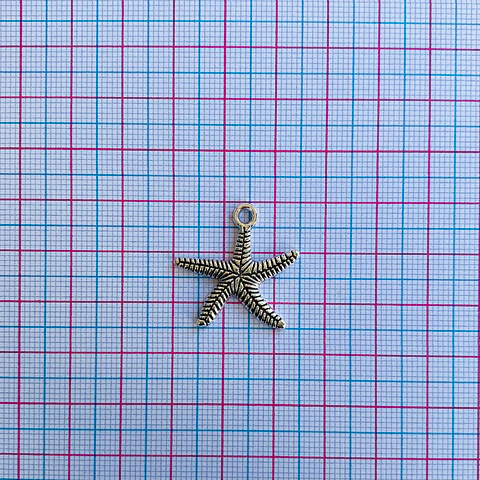 DIJE ESTRELLA DE MAR ZAMAK