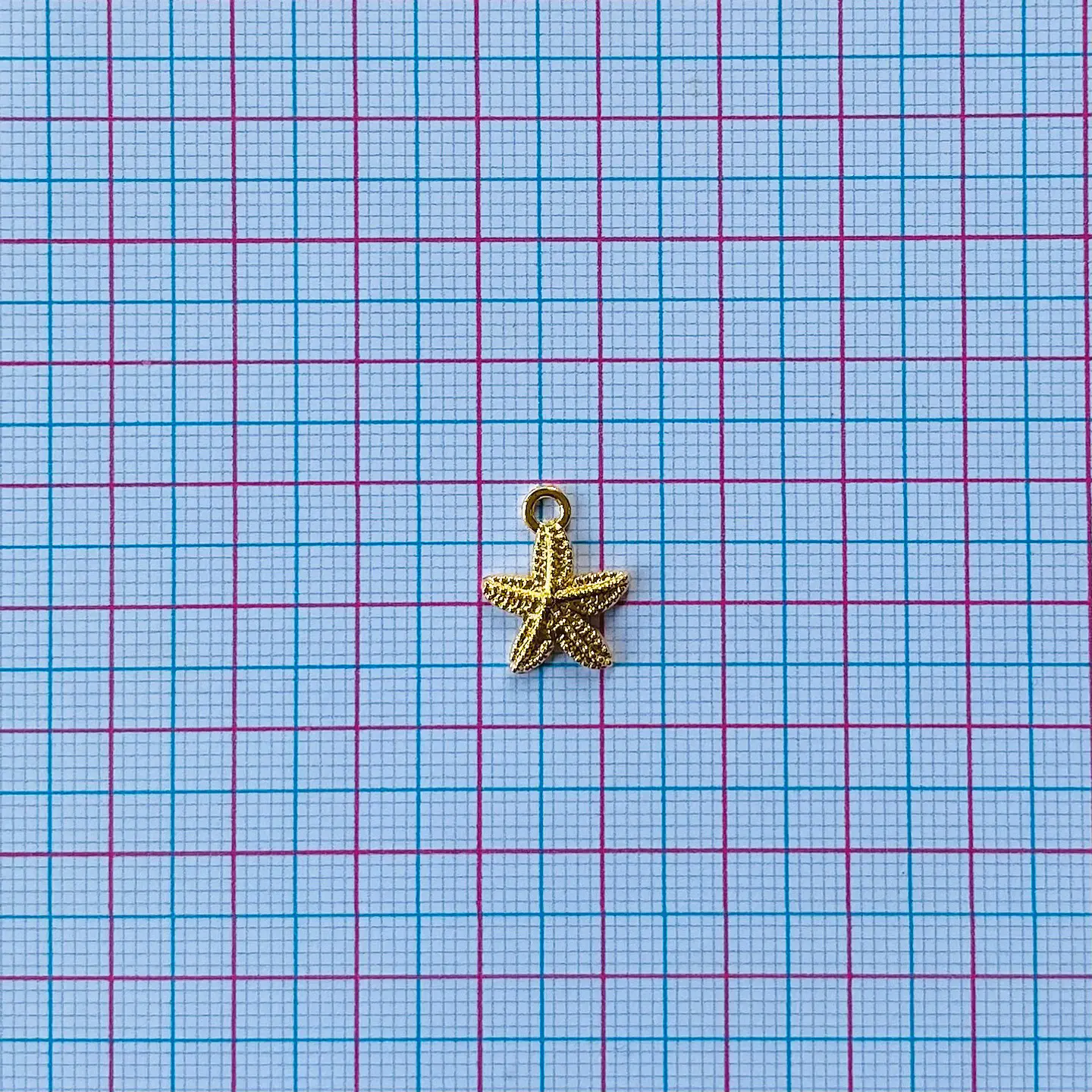 DIJE ESTRELLA DE MAR BAÑO DE ORO  2