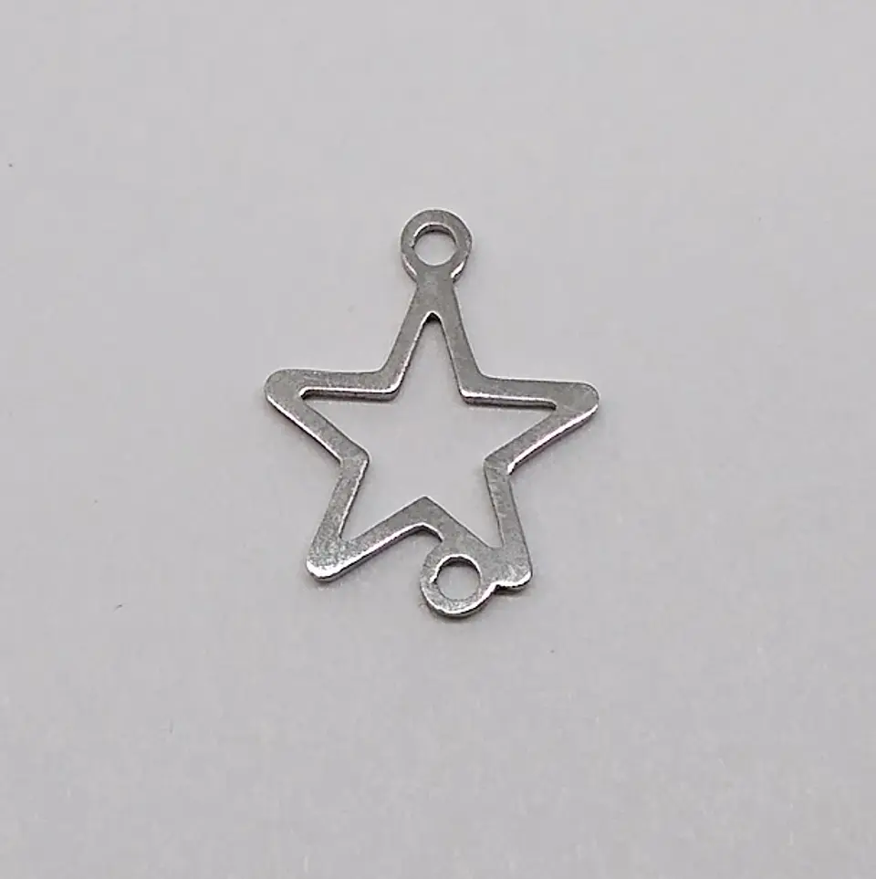 DIJE ✦ ESTRELLA EN ACERO  1