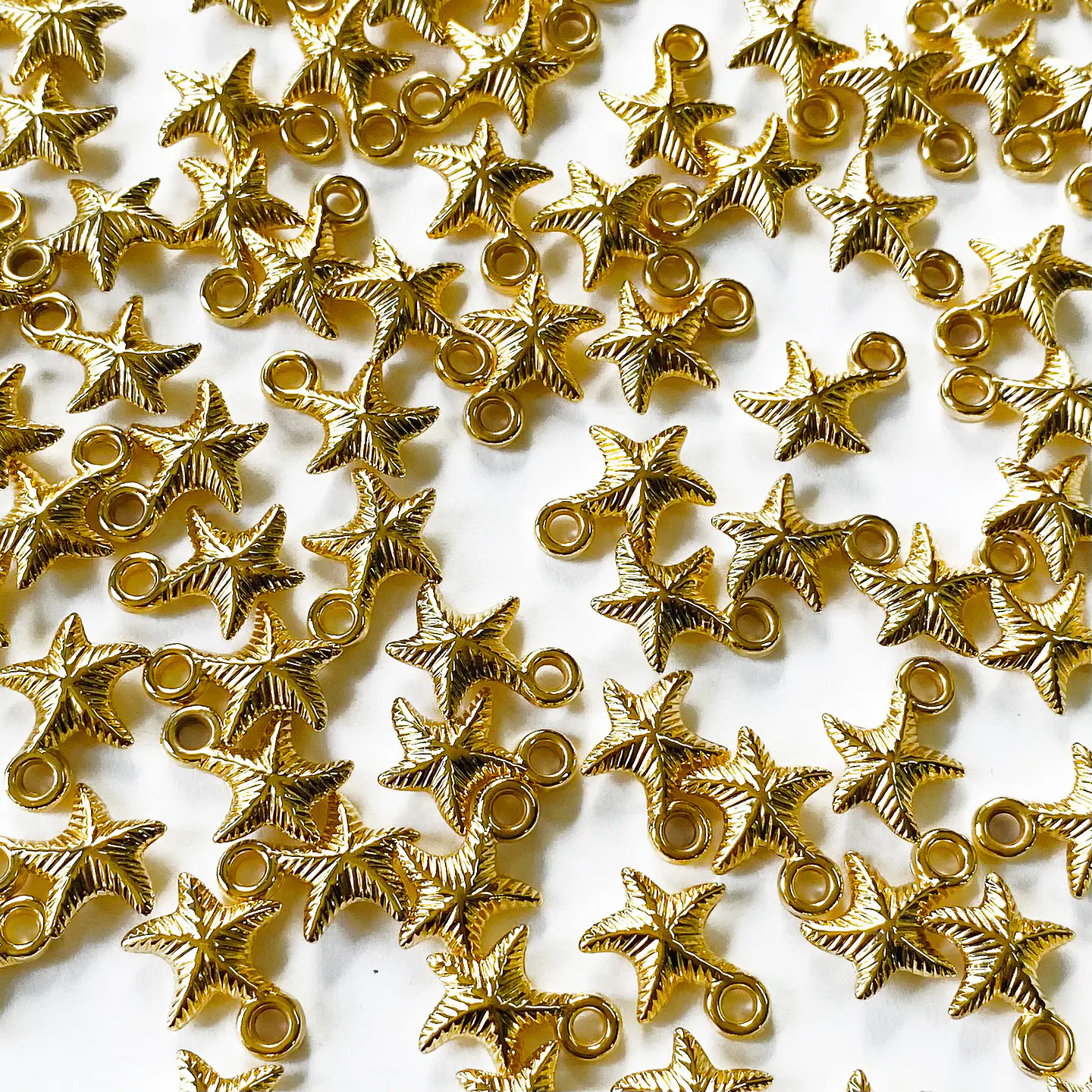DIJE ESTRELLA DE MAR BAÑO DE ORO Z096-G 1