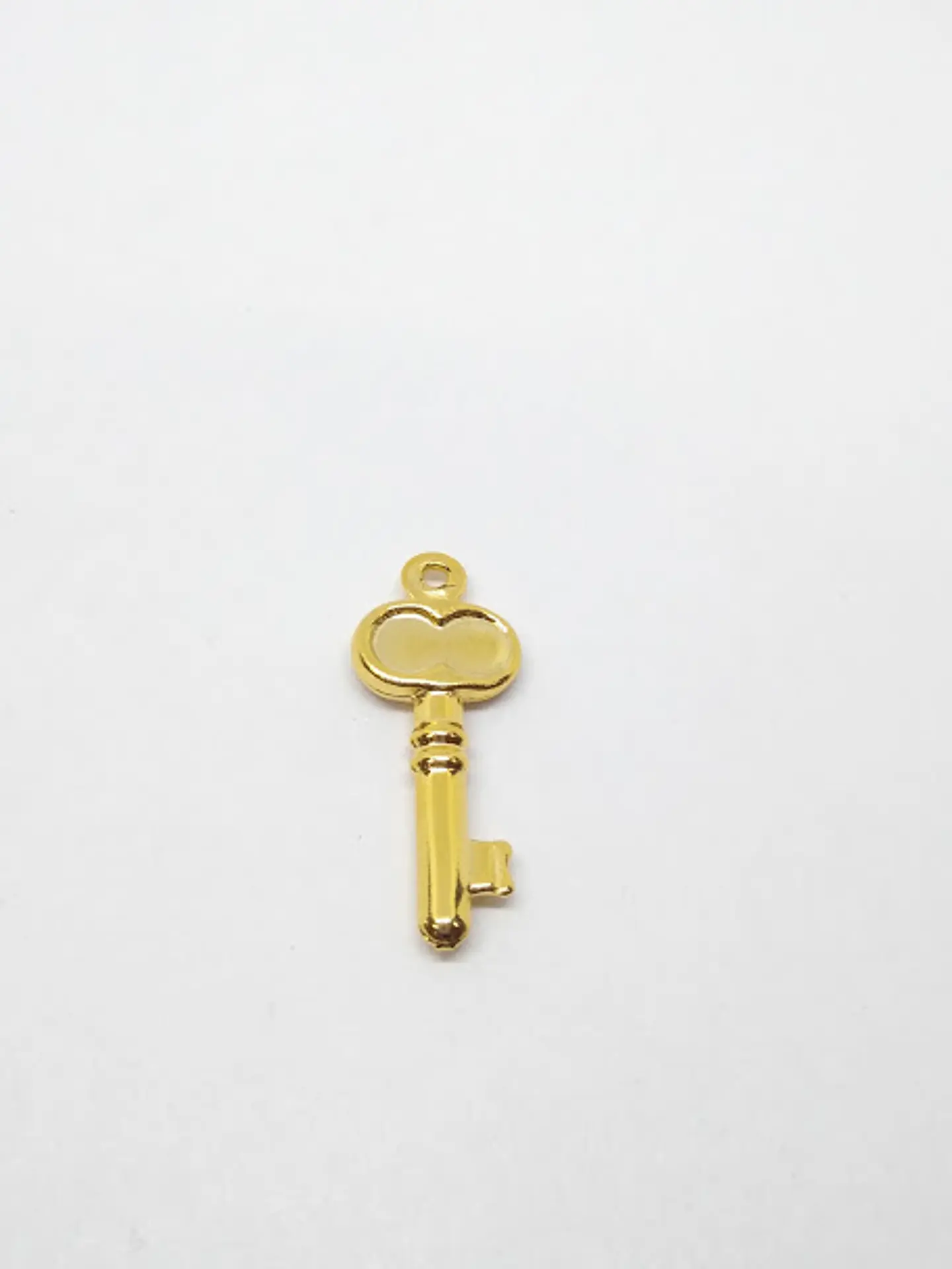 LLAVE MINI DIJE BAÑO DE ORO XW00775                                    1