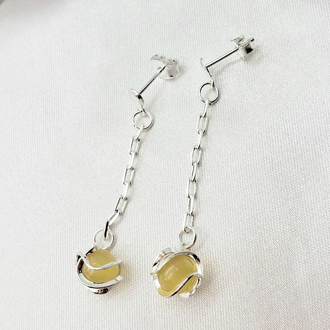 ARETE ✦ LARGO CON PIEDRA IMITACIÓN CITRINO 