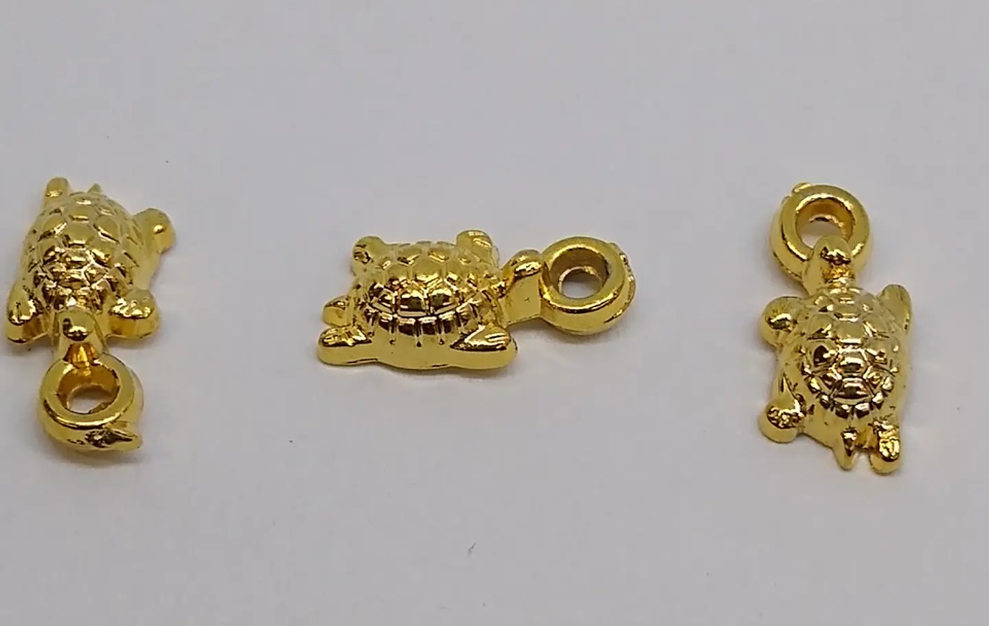 TORTUGA BAÑO DE ORO S720                                1