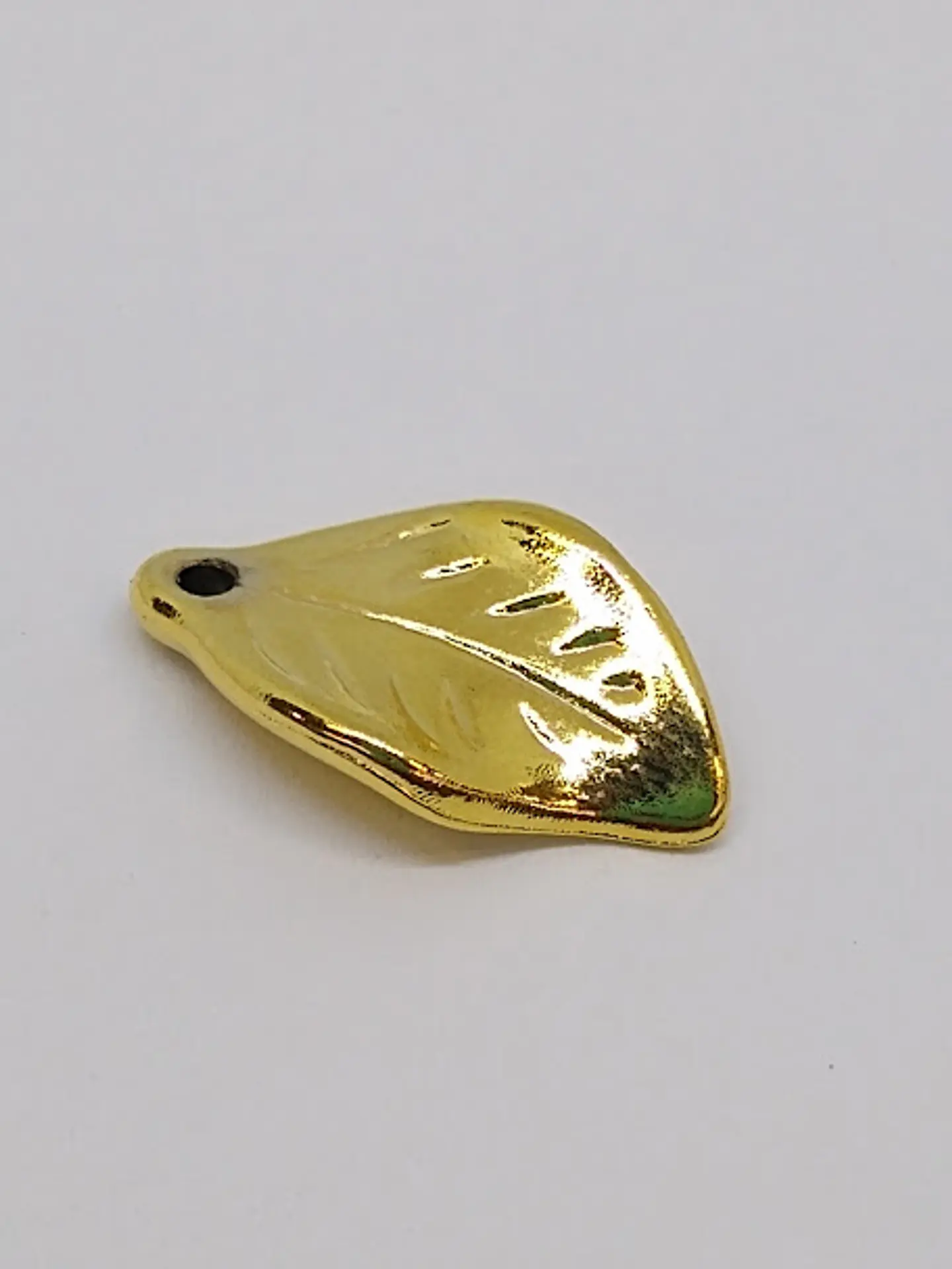 DIJE HOJA BAÑO DE ORO 1