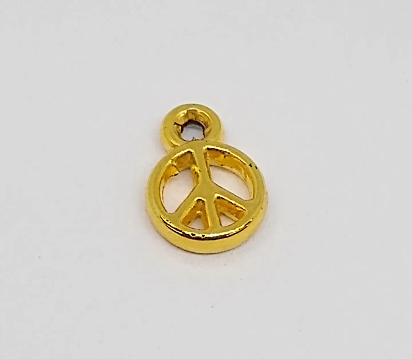 SÍMBOLO DE LA PAZ BAÑO DE ORO T985                                              1