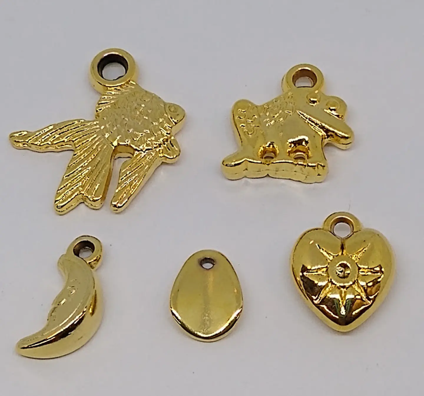 FIGURAS BAÑO DE ORO H12#                                      1